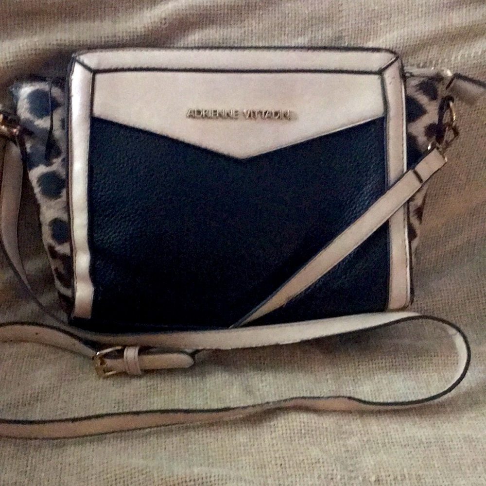 Used black and cream  designer  with leopard print.Lots of life left.